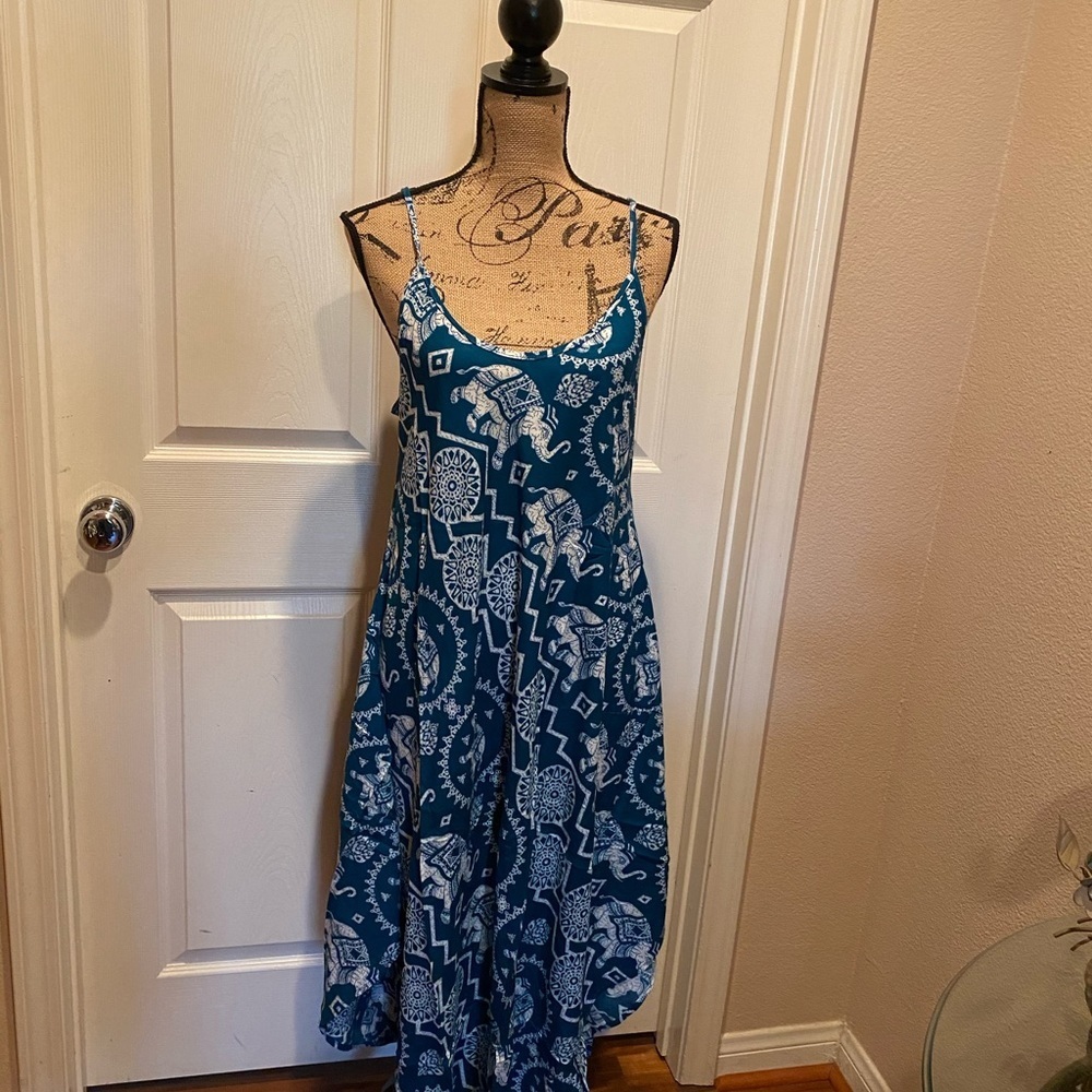 Green and white elephant print, thin strap dress.